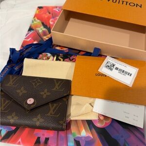 Louis Vuitton Brown and Pink Victorine Wallet.